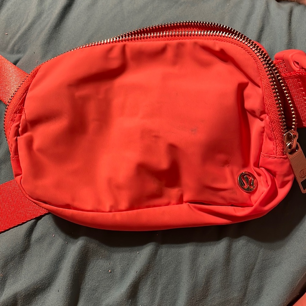 Lululemon belt bag in raspberry cream